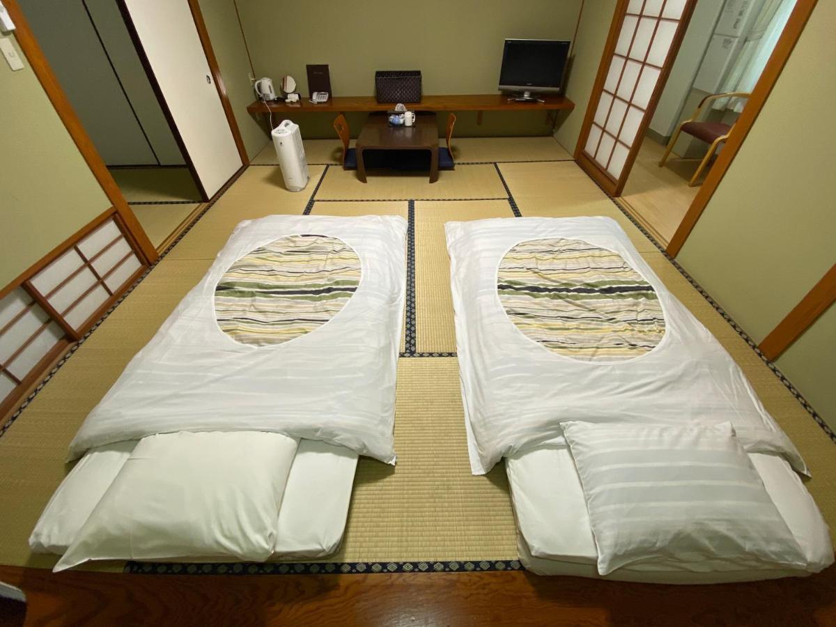 Fuji Hokin Kaikan Hotel Yamanakako Bagian luar foto
